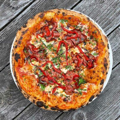 Stoked Pizzeria Roasted Red Pepper & Capicola pizza
